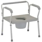 A commode chair with the lid up.